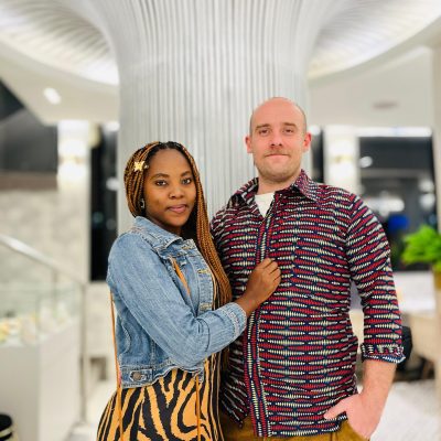 Peace and Tom (co-founders of East Africa Travel POP) posing for a photo in Krave Restaurant in Nairobi, Kenya